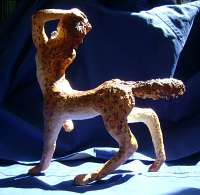 Sculpture by Chris Wayan of a dancing cattaur, a centauroid people on Abyssia, an Earth where up is down and down is up. Click to enlarge.