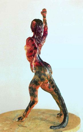 A dancing cat; clay sculpture by Wayan. Click to enlarge.