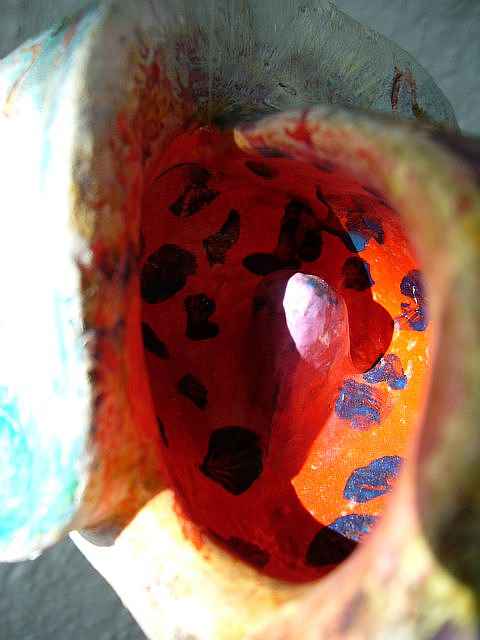 wet red hollow with erect nubbin, in fishy sculpture