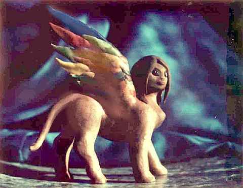 A plasticine model of a sphinx with multicolored wings, made for claymation.