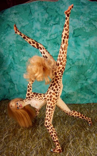 Barbie sculpture illustrating a dream by Chris Wayan: a gracile centauroid dancer, Zara, cream with brown dalmatian spots, doing a handstand.