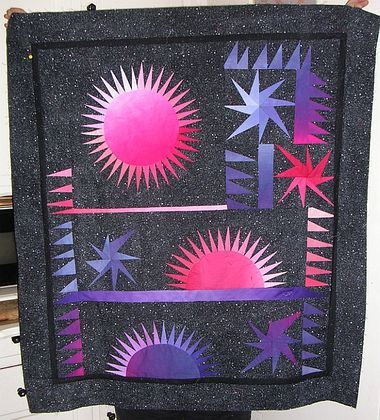 'Redeye to New York', a black stellar quilt by Joy-Lily, foreseen in Catshall's dream. Click to enlarge.