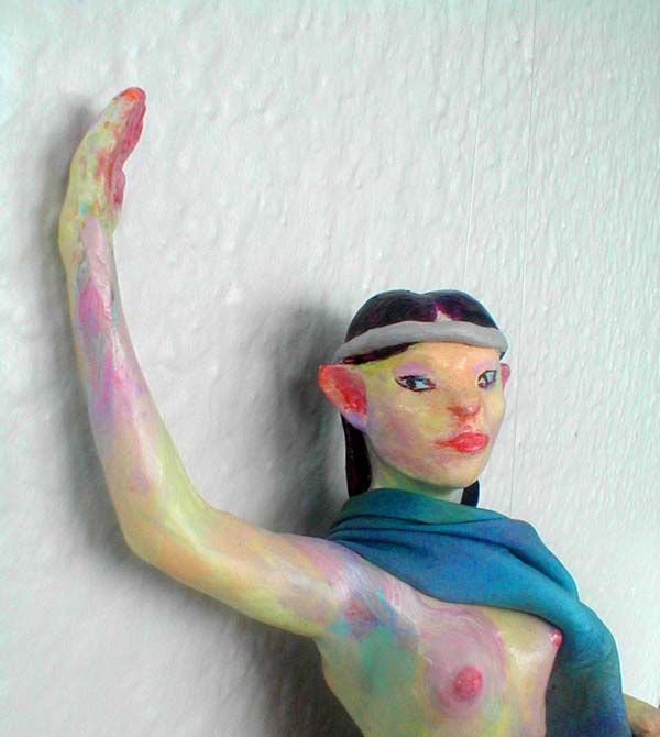 close-up of Elven-dancer in blue cloak; a hanging sculpture. Click to enlarge.