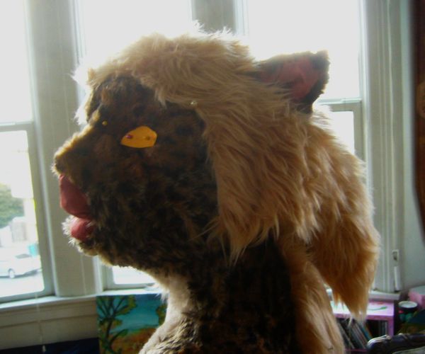 Cattaur face--half done, no eyes yet, but some fur pinned on. Dream sculpture by Wayan.
