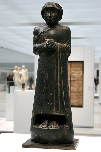 Diorite statue of Gudea of Lagash, c.2125 BCE. Photo by Jean-Pol Grandmont. Click to enlarge.