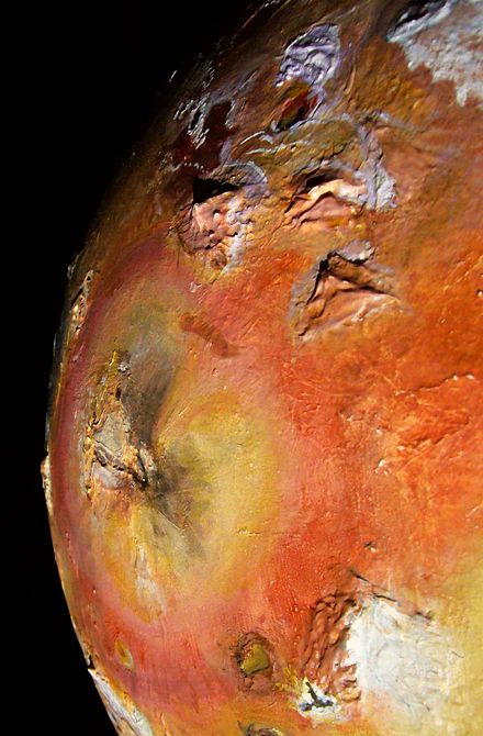 Peaks around Pele on Io: Boosaule Mts (top right, 18 km high), Pillan (lower right, 5.5 km), Caucasus (lower left, 10.6), and Egypt (left edge, 10); sculpted by Chris Wayan. Click to enlarge.