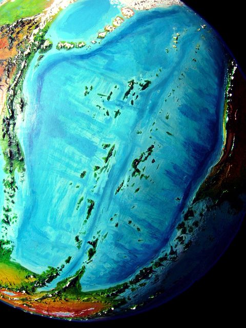Orbital photo of the Artaho Islands, two green chains between Homa (left) and Ara (right), desert continents on Kakalea, an unlucky Earthlike world full of Australias.
