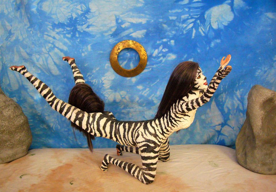 Suplica, a zebra-striped centauroid dancer. Click to enlarge