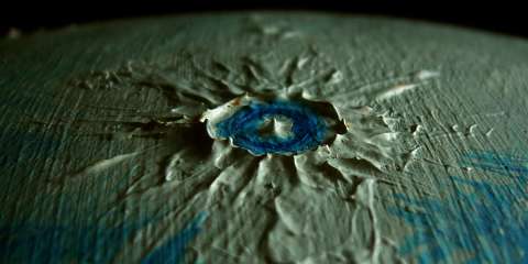 Orbital photo of Dawnring Crater on the equatorial nightside of Libratia, a tidelocked world.