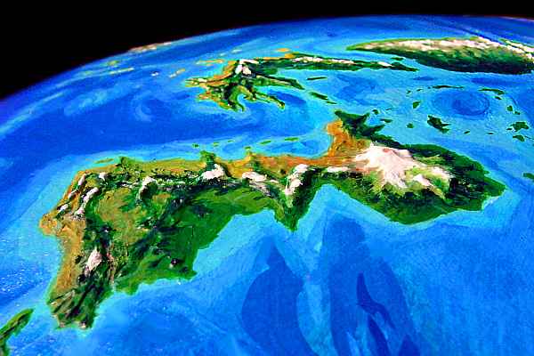 Orbital photo of central Roland: Roland proper in foreground, Barbro (center left), and Polaris (upper right). Olga is just visible on the horizon. Roland is a subarctic archipelago on Lyr, a model of a huge sea-world. Click to enlarge.