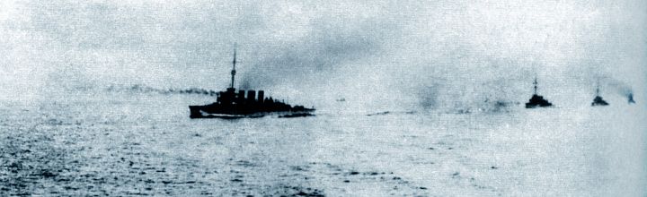 Grayscale photo of WWI-vintage British cruisers off Scapa Flow; illustration from JB Priestley's 'Man and Time', page 226