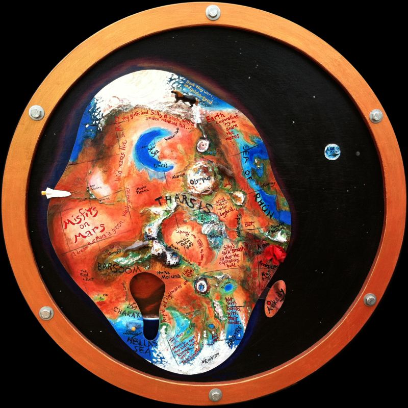 Dream-painting by Wayan: 'Misfits on Mars.' Through a bronze porthole, a plywood living Mars floats in space, with forests, seas, glued-on volcanoes, toy animals and space shuttles. Click to enlarge & read dream.