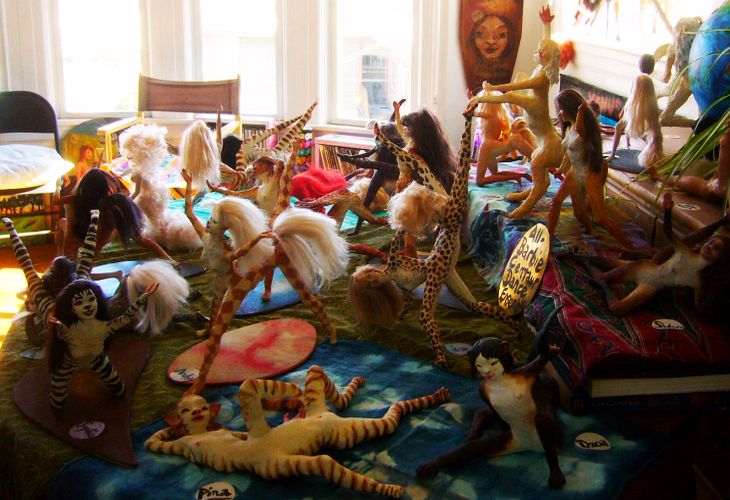 the All-Barbie Centaur Dance Ensemble, a sculpture-group made of altered Barbies, by Wayan. Click to enlarge.