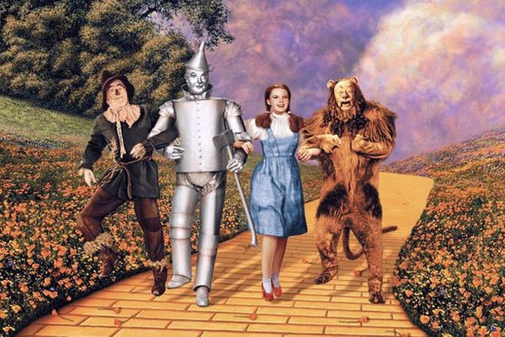 Scarecrow, Tin Man, Dorothy & Cowardly Lion on the Yellow Brick Road.