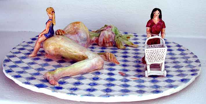Ceramic sculpture of a giant sleeping woman half embedded in a tiled supermarket floor; scene from a dream. Click to enlarge.