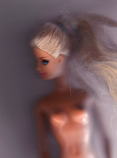 Barbie doll as seen by a flatbed scanner; illustration of a dream by Wayan. Click to enlarge.
