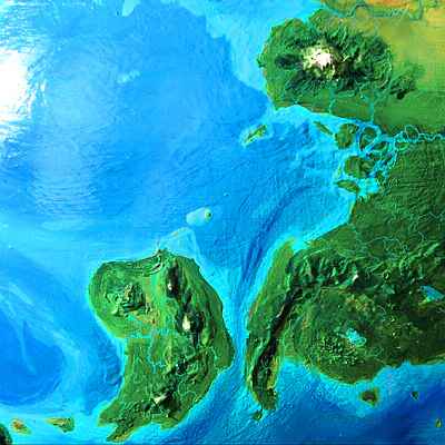 Orbital photo of rainforested Anigvess Island and Cape Nirit to the its east, on Serrana, an experimental model of a small, dry, but viable planet.