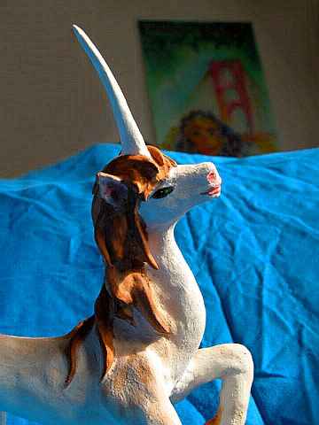 Profile of a unicorn stallion: painted sculpture. Click to enlarge.